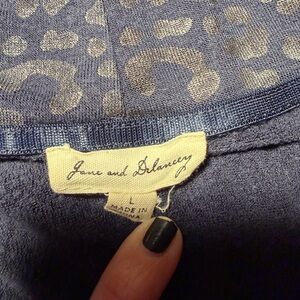 Navy blue, cheetah print, funnel neck sweater